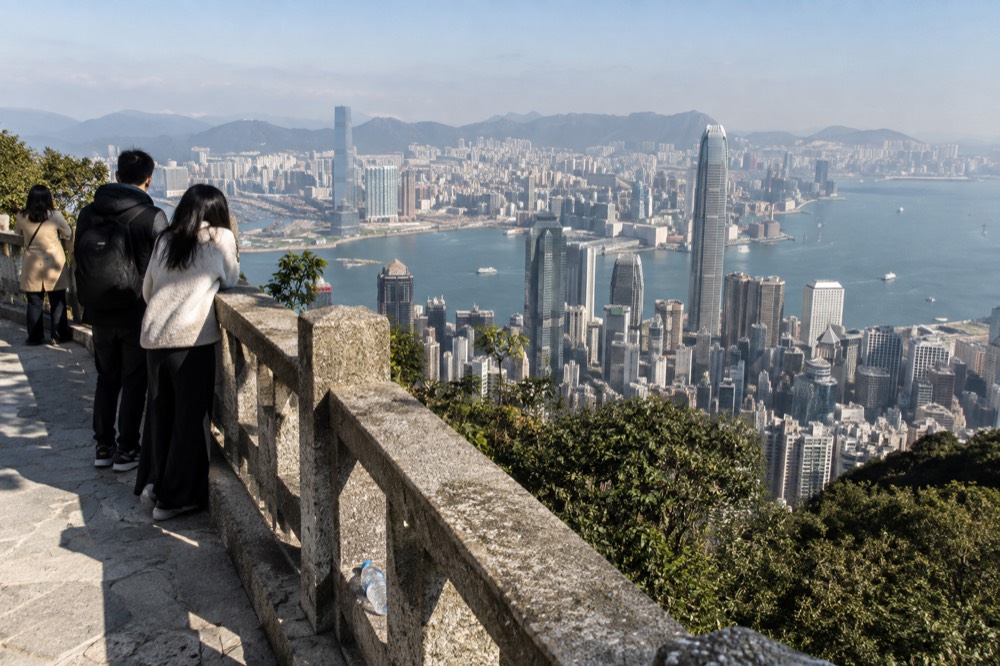 View over Hong Kong skyscrapers and Victoria Harbour seen from the upper terminus area