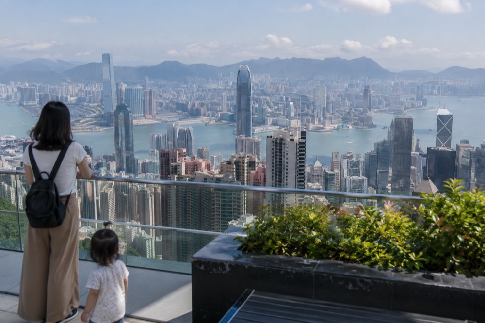 Harbour and skyline panorama from a free rooftop viewing deck at the Peak