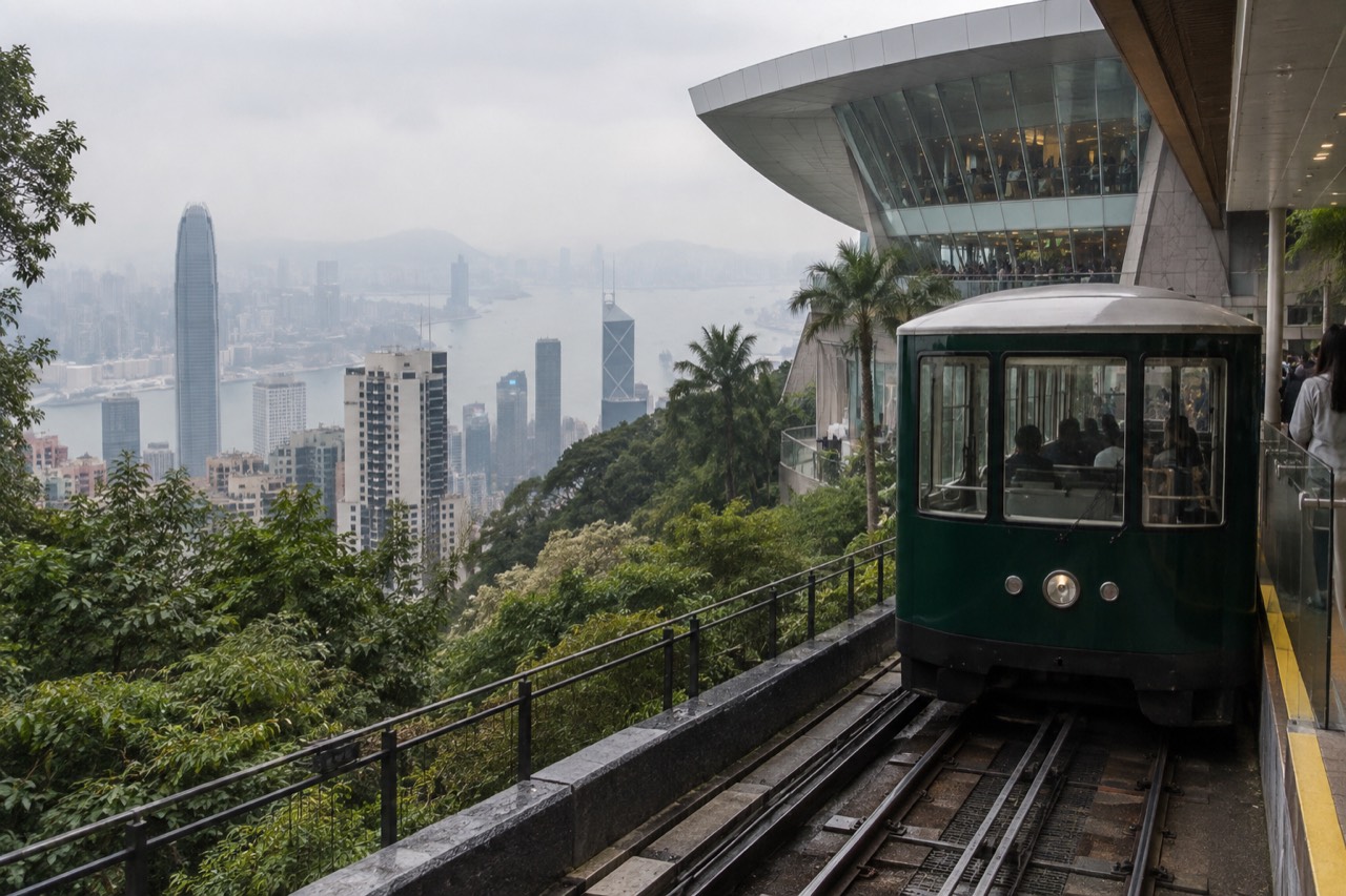 Green Peak Tram funicular car at the upper terminus platform above Hong Kong