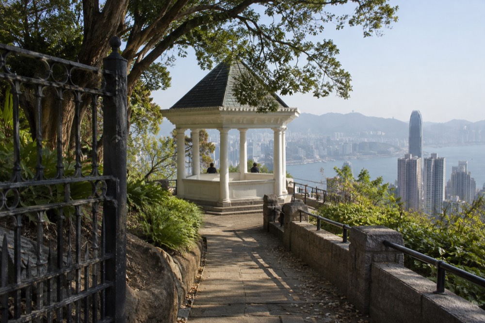 Victorian-style garden pavilion and lawns above the Hong Kong skyline