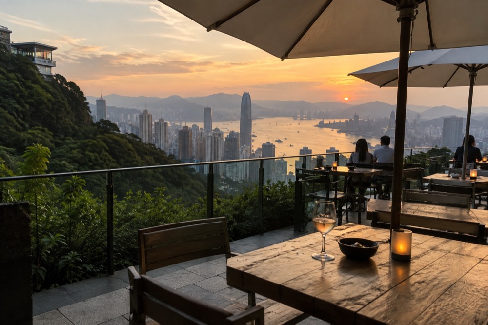Restaurant terrace with parasols and harbour view at dusk